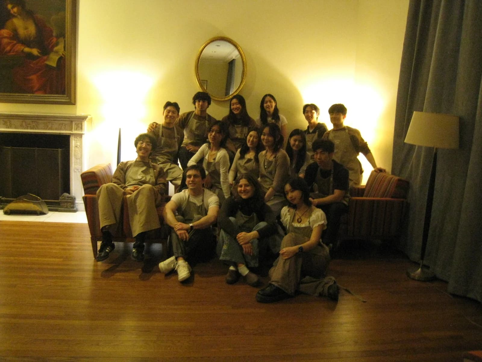 Latte Lab members in aprons gathered for a group photo